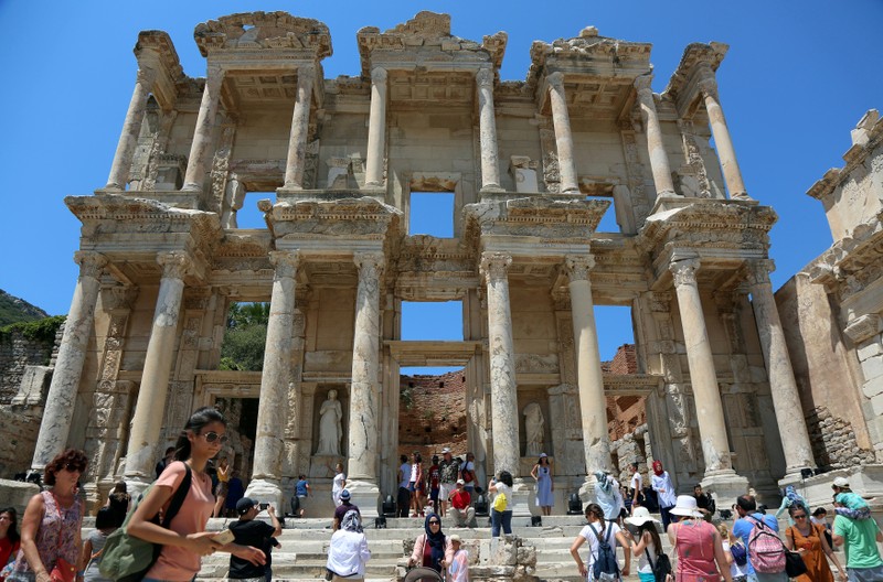 FILE PHOTO: Tourists visit the Celsius Library in the ancient city of Ephesus near Izmir in the western Aegean region