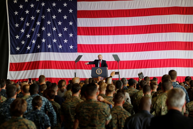 U.S. President Donald Trump delivers remarks to U.S. military personnel at Naval Air Station Sigonella following the G7 Summit, in Sigonella
