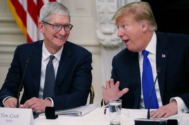 Apple CEO Cook and U.S. President Trump participate in American Workforce Policy Advisory Board meeting at the White House in Washington
