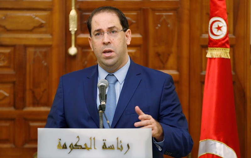 FILE PHOTO: Tunisia's Prime Minister Youssef Chahed attends a news conference in Tunis