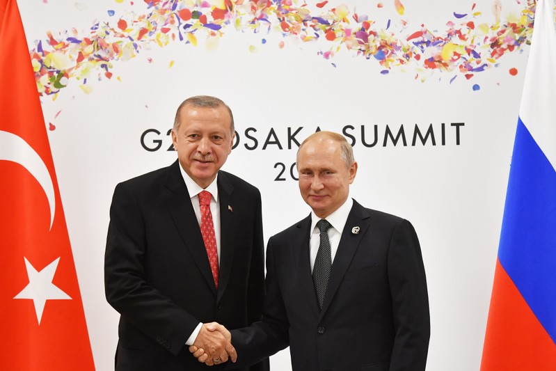 Russian President Putin and Turkish President Erdogan attend their bilateral meeting on the sidelines of the G20 leaders summit in Osaka