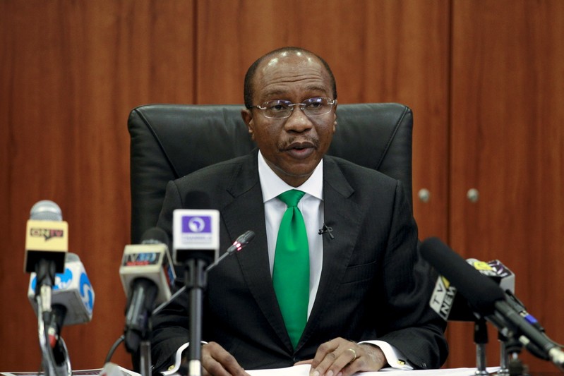 Governor Godwin Emefiele announce that NIgeria's central bank is keeping its benchmark interest rate on hold at 13 percent in Abuja