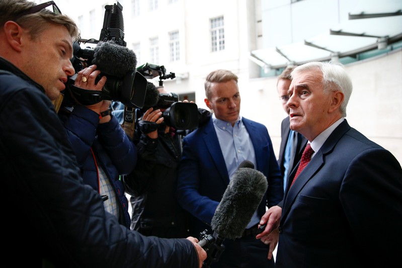 British Labour politician John McDonnell speaks to media outside the BBC headquarters after appearing on the Andrew Marr show in London