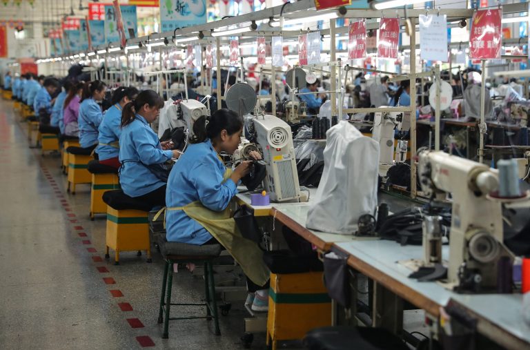 A private survey shows China’s manufacturing activity expanded more than expected in September