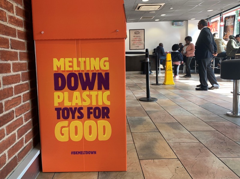 A plastic toy recycling box is seen inside a Burger King restaurant in Manchester