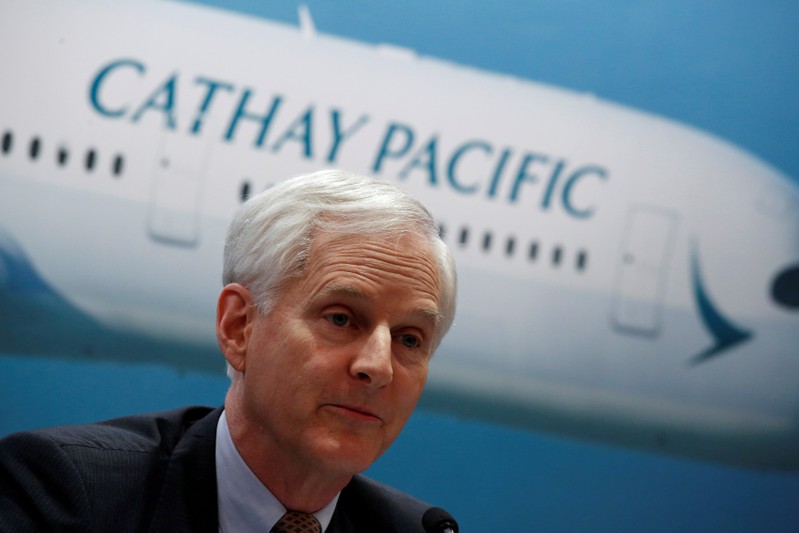 FILE PHOTO: Cathay Pacific Group Chairman John Slosar attends a news conference in Hong Kong