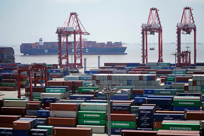 FILE PHOTO: Containers are seen at the Yangshan Deep Water Port in Shanghai