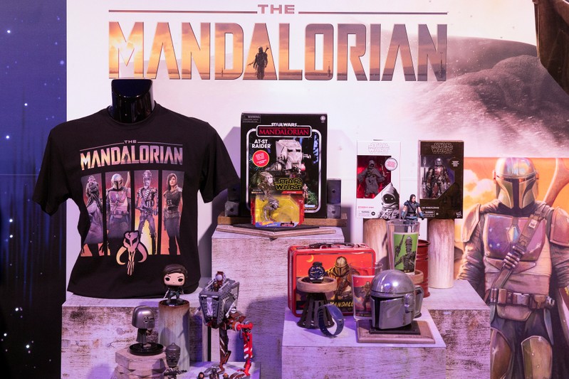Merchandise from Star Wars: The Mandalorian, television series sit on display at the announcement of new Star Wars products at Pinewood Studios, Iver Heath