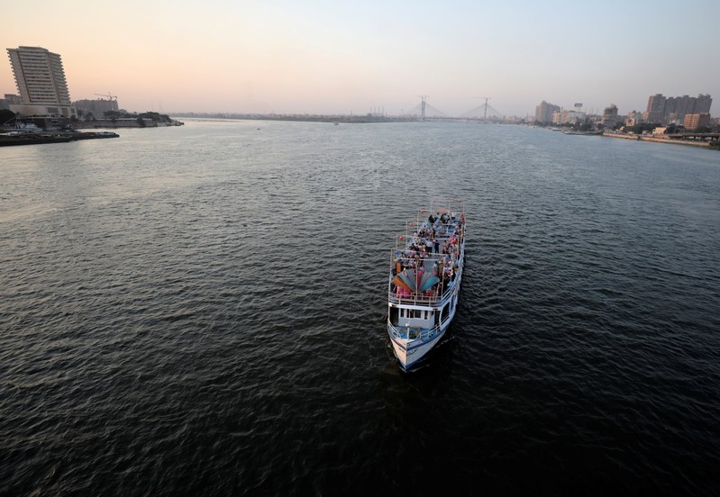 A boat transports people along the river Nile in Cairo