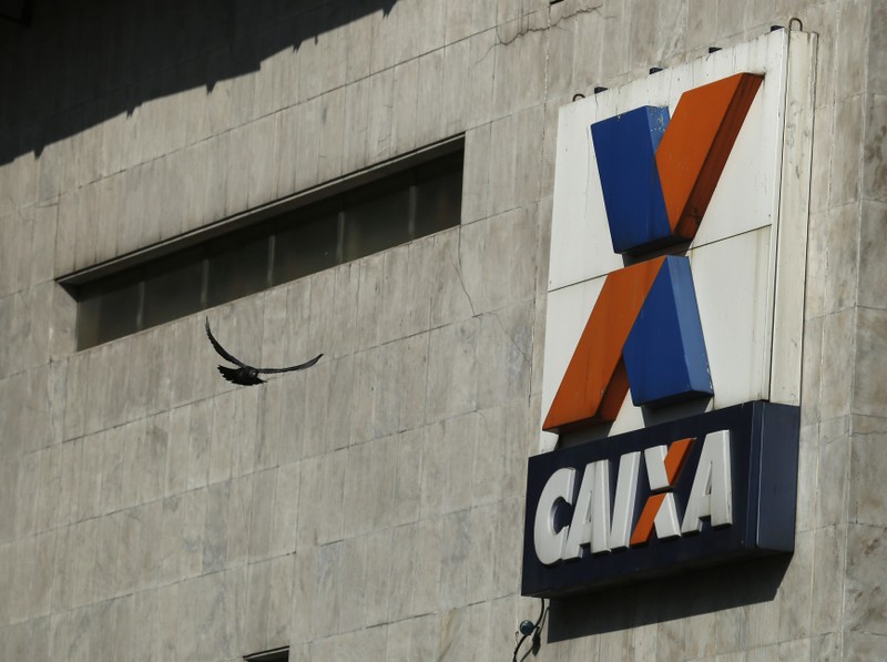 FILE PHOTO: A view shows the company logo of Caixa Economica Federal bank in downtown Rio de Janeiro