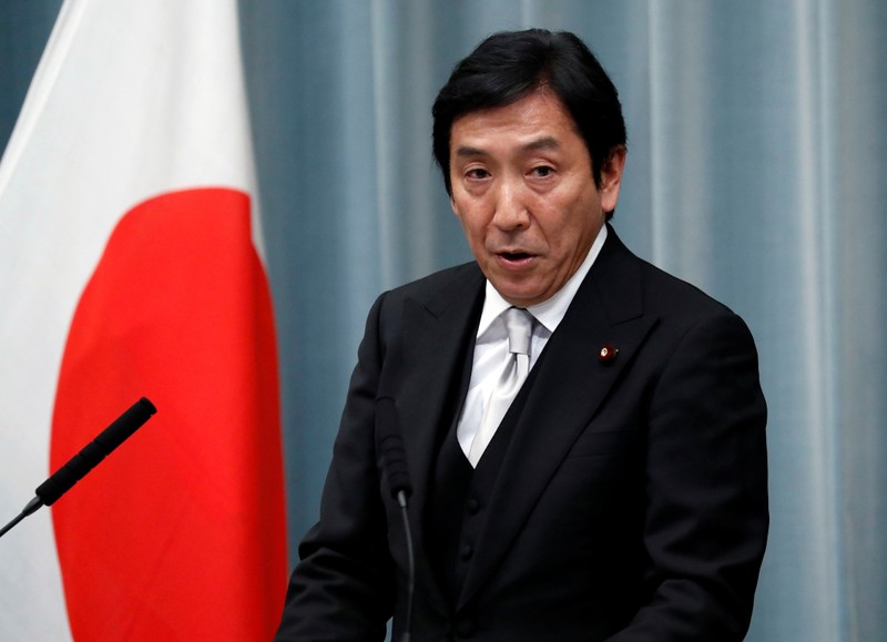 Japan's Economy, Trade and Industry Minister Sugawara attends a news conference at PM Abe's official residence in Tokyo
