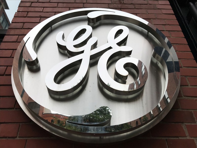 FILE PHOTO: The General Electric Co. logo is seen on the company's corporate headquarters building in Boston