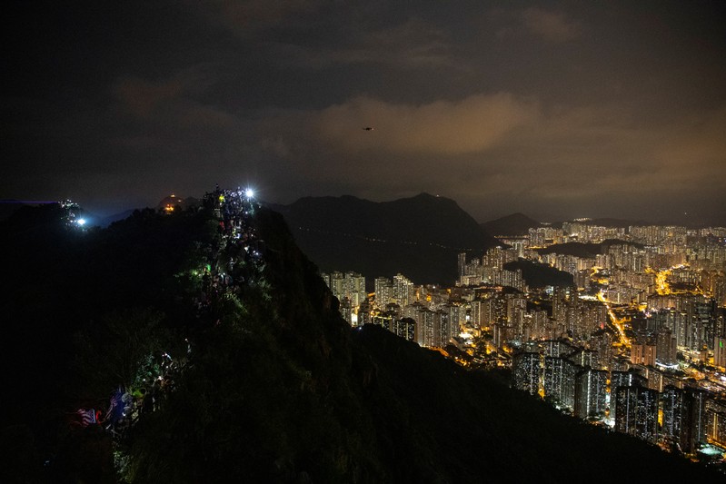 Anti-government protesters gather at Lion Rock, in Hong Kong