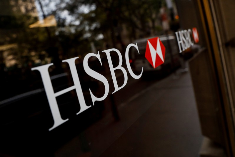 FILE PHOTO: HSBC logos are seen on a branch bank in the financial district in New York