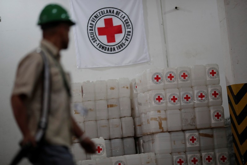 The logo of the International Federation of Red Cross is seen on boxes at the warehouse of Venezuelan Red Cross, where international humanitarian aid for Venezuela is being stored, in Caracas
