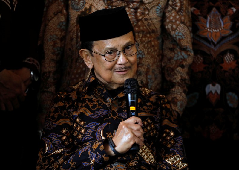 Former Indonesian President B.J. Habibie speaks with the media following his meeting with Malaysian politician Anwar Ibrahim at Habibie's home in Jakarta,