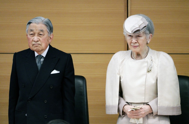 FILE PHOTO: Japan's Emperor Akihito and Empress Michiko attend the awarding ceremony of the Midori Academic Prize in Tokyo.