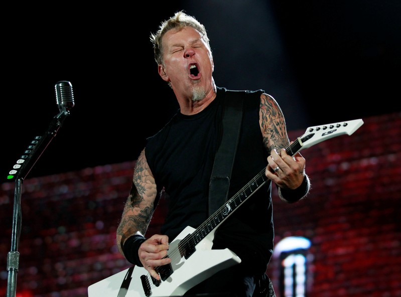 FILE PHOTO: James Hetfield, lead vocalist of the heavy metal group Metallica performs during their World Magnetic tour concert in Abu Dhabi