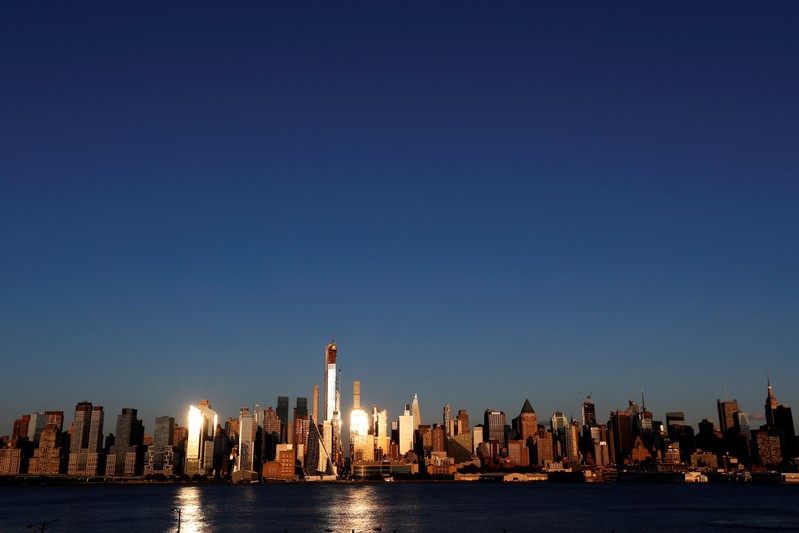 FILE PHOTO: The midtown Manhattan skyline is seen at sunset in New York