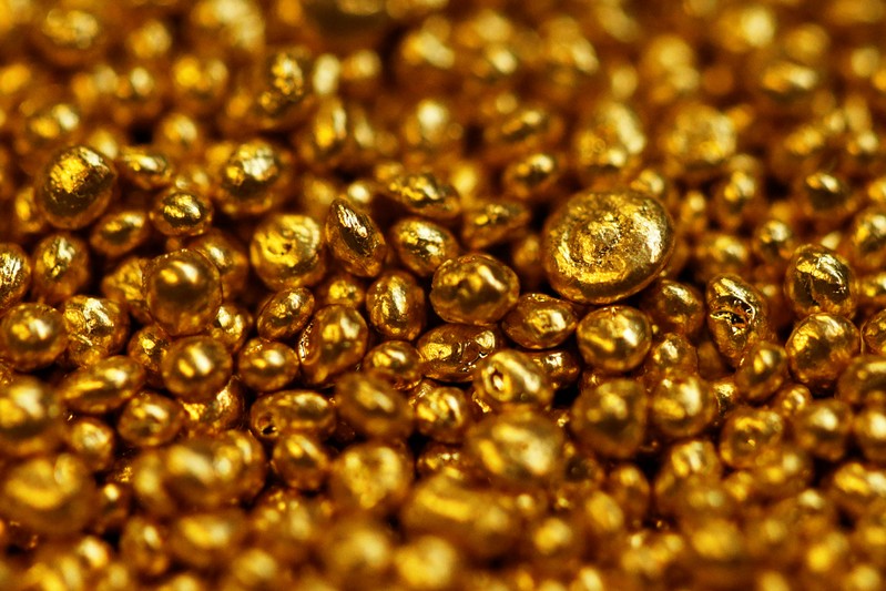 FILE PHOTO : Gold granulate is seen at a plant of a gold refiner and bar manufacturer in the southern Swiss town of Balerna