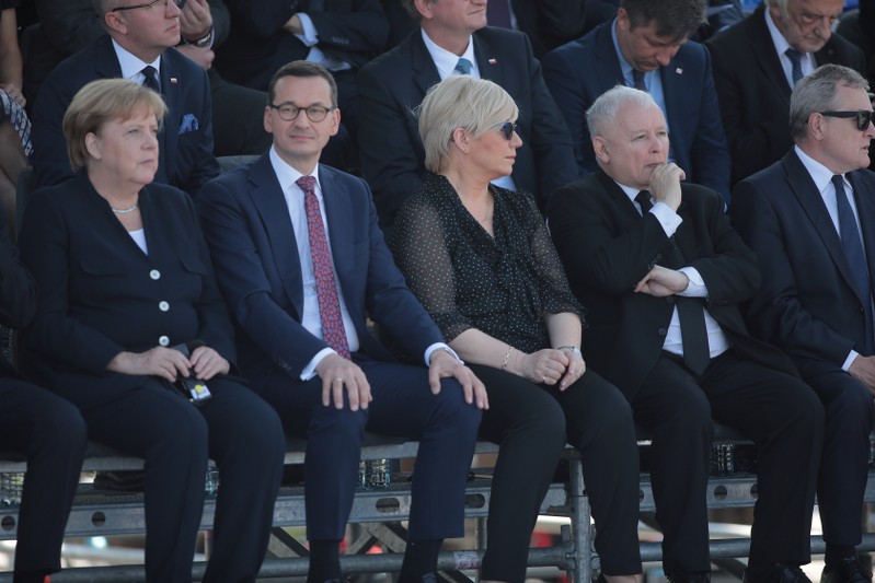 Officials attend a ceremony to mark the anniversary of the outbreak of World War Two in Warsaw