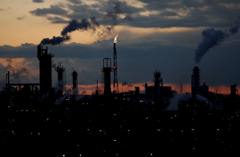 FILE PHOTO: Steam is emitted from factories at sunset in Keihin industrial zone in Kawasaki