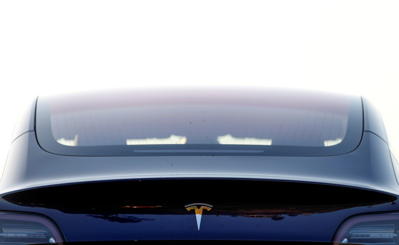 A 2018 Tesla Model 3 electric vehicle is shown in Cardiff, California