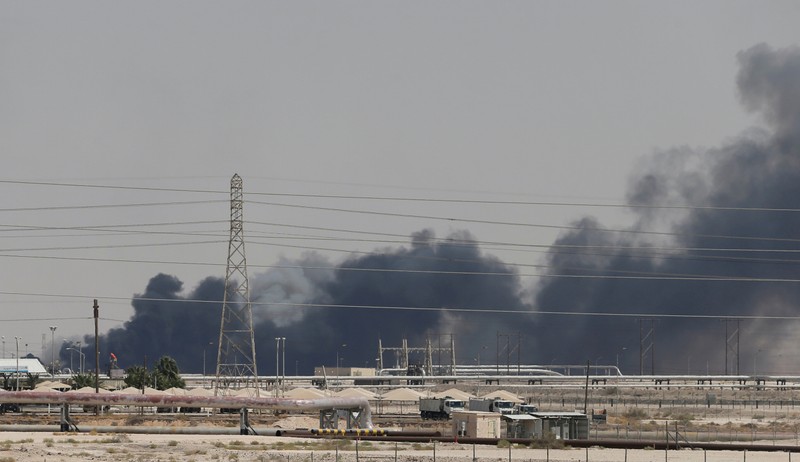 FILE PHOTO: FILE PHOTO: Smoke is seen following a fire at Aramco facility in the eastern city of Abqaiq