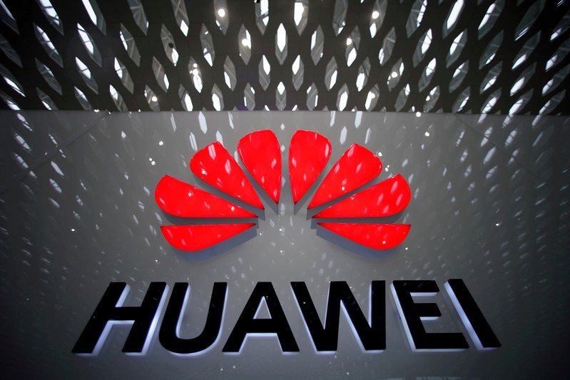 FILE PHOTO: A Huawei company logo is pictured at the Shenzhen International Airport in Shenzhen, China