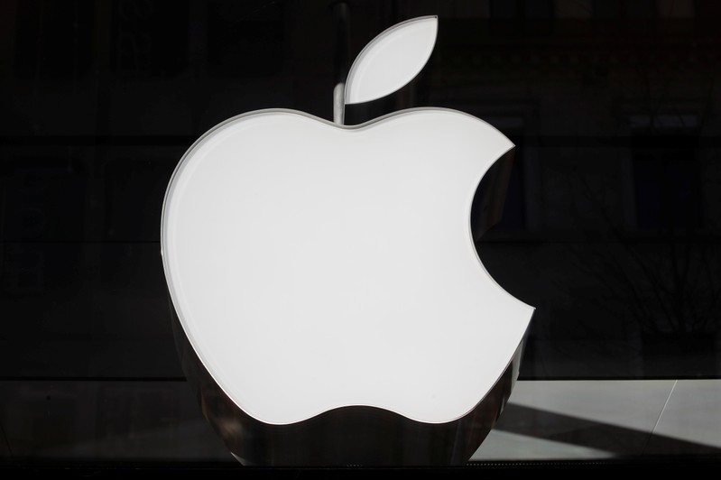 FILE PHOTO: Logo of Apple is seen at a store in Zurich