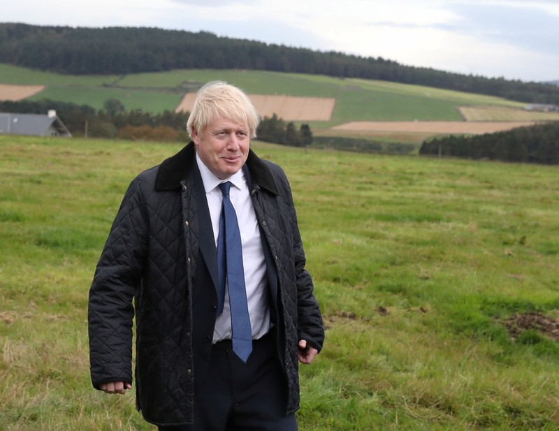 Britain's Prime Minister Boris Johnson visits Darnford Farm in Darnford, Banchory near Aberdeen