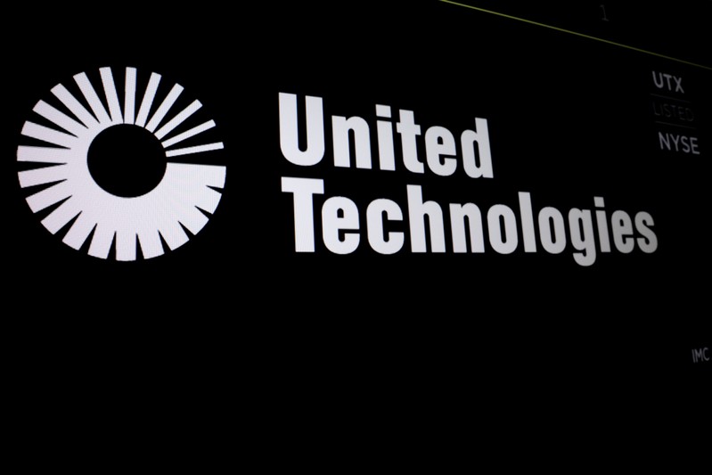 United Technologies logo is displayed on a screen at the post where it's stock is traded on the floor of the NYSE in New York