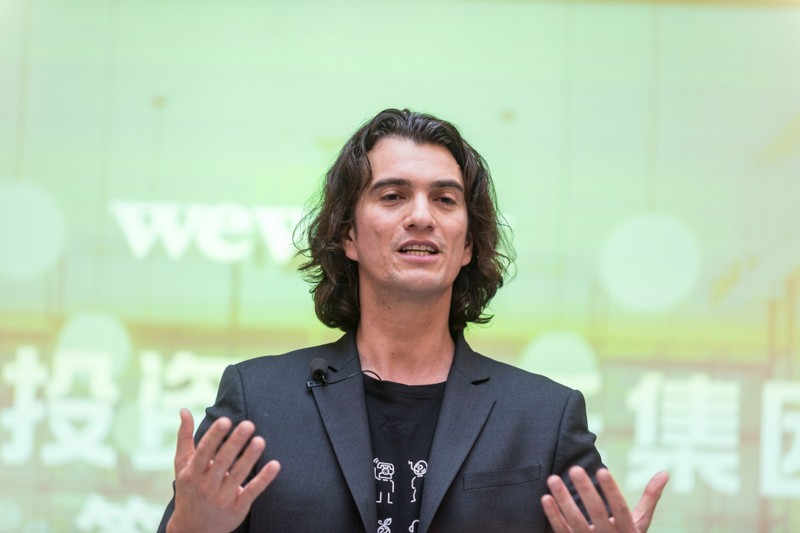 FILE PHOTO: Adam Neumann, chief executive officer of U.S. co-working firm WeWork, speaks during a signing ceremony in Shanghai