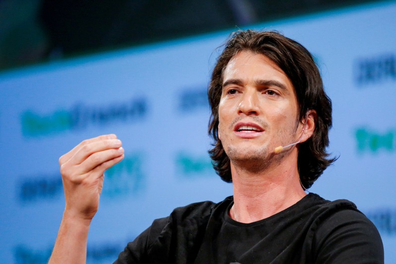 FILE PHOTO: Neumann, CEO of WeWork, speaks to guests during the TechCrunch Disrupt event in Manhattan, in New York City