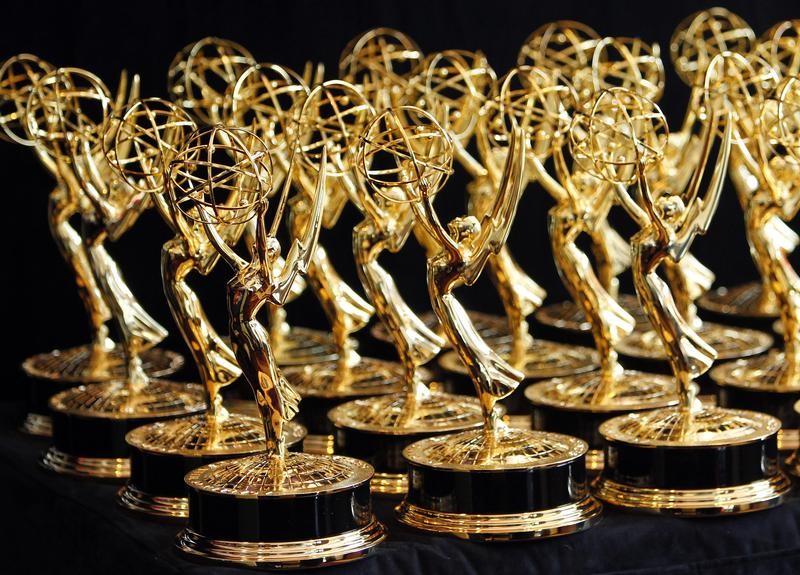 FILE PHOTO - Dozens of Emmy Awards are lined up on the trophy table in the media center at the 62nd annual Primetime Emmy Awards in Los Angeles