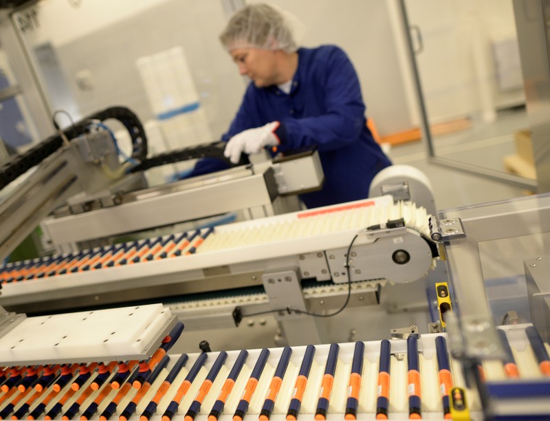 FILE PHOTO: A Novo Nordisk employee controls a machine at an insulin production line in a plant in Kalundborg