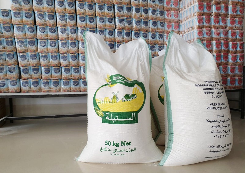 Sacks of flour are pictured inside a mill in Beirut