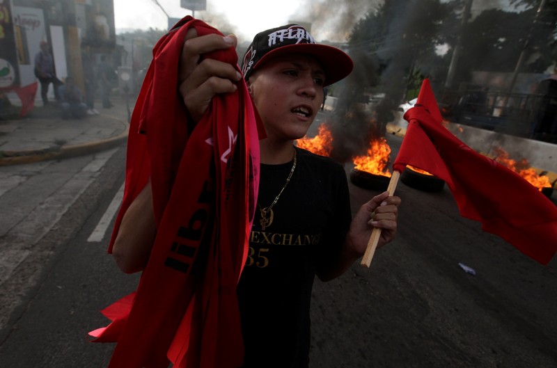 A demonstrator takes part in a protest against the government of president Juan Orlando Hernandez in Tegucigalpa
