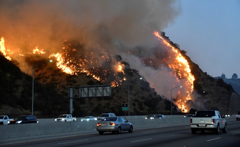 The Getty Fire burns near the Getty Center along the 405 freeway north of Los Angeles, California