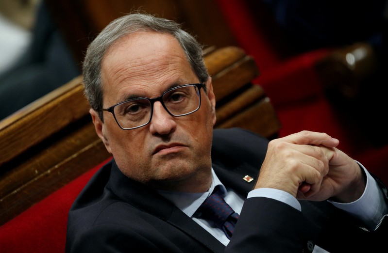 Catalan leader Quim Torra sits in the Parliament in Barcelona