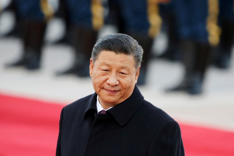 FILE PHOTO: Chinese President Xi Jinping attends a welcome ceremony outside the Great Hall of the People in Beijing