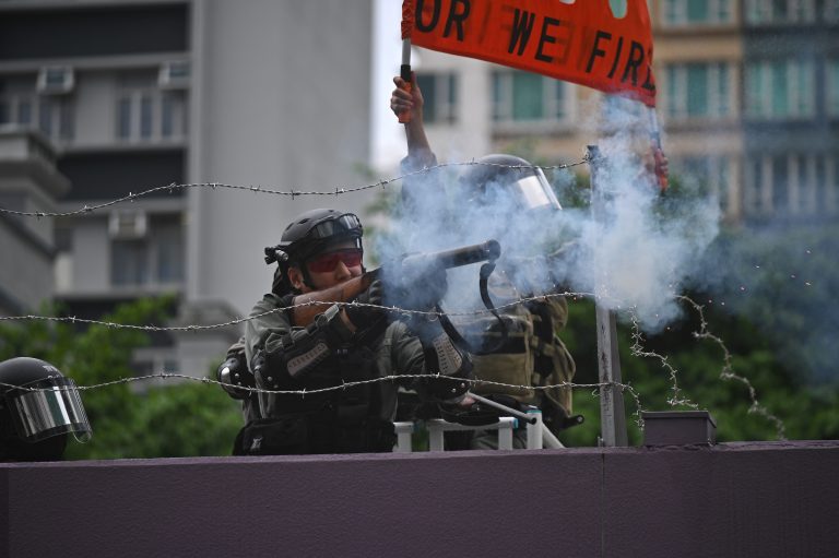 Chinese soldiers in Hong Kong warn protesters as emergency rules fail to quell unrest