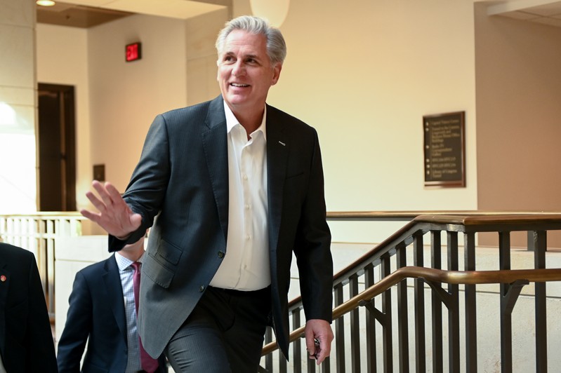 House Minority Leader McCarthy waves to Capitol visitors during a break in a closed-door impeachment inquiry into U.S. President Trump on Capitol Hill in Washington
