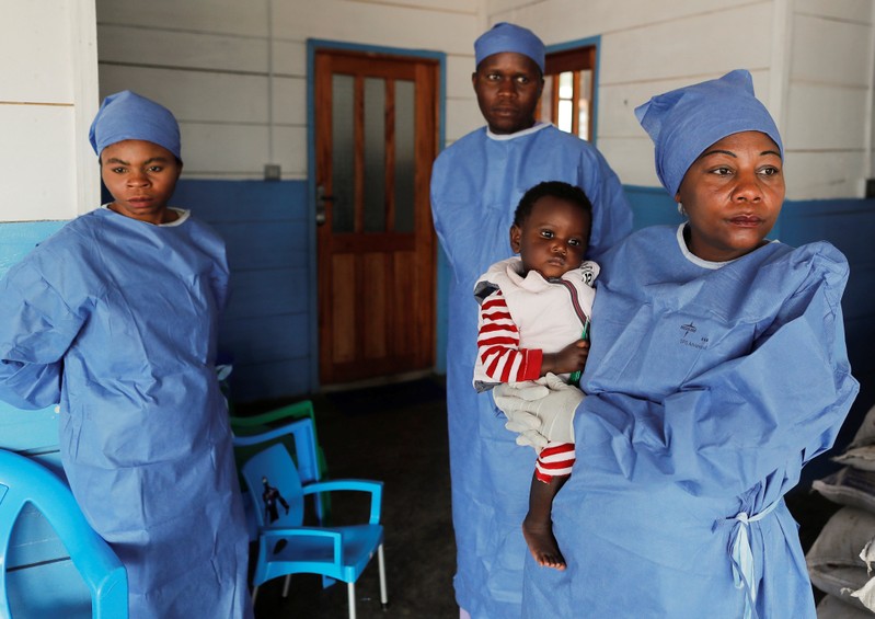 The Wider Image: Ebola survivors battle grief and stigma in eastern Congo