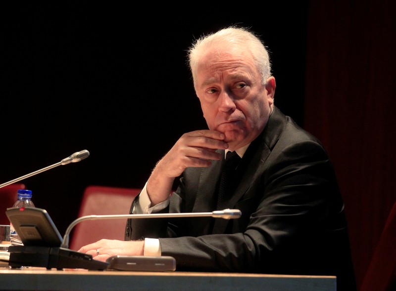 FILE PHOTO: Bank of Portugal Governor Carlos Costa listens at a conference in