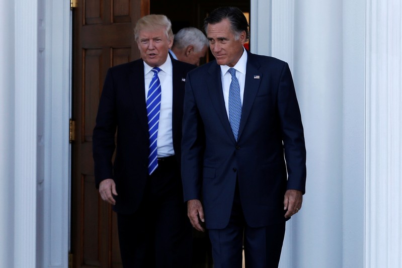 FILE PHOTO: U.S. President-elect Donald Trump and former Massachusetts Governor Mitt Romney emerge after their meeting at the main clubhouse at Trump National Golf Club in Bedminster