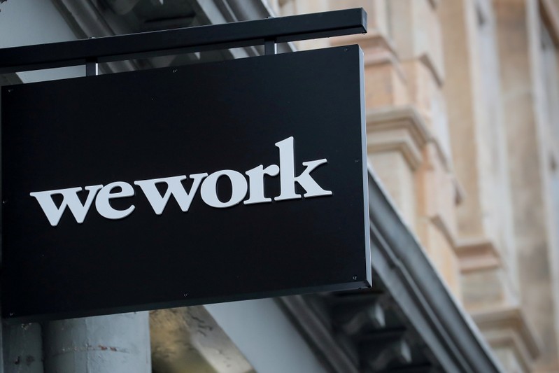 FILE PHOTO: The WeWork logo is displayed outside of a co-working space in New York