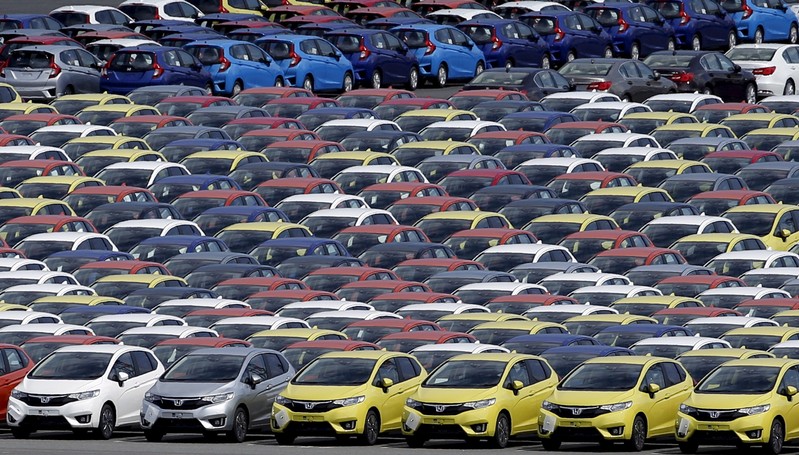 FILE PHOTO: Newly manufactured cars of the automobile maker Honda await export at port in Yokohama