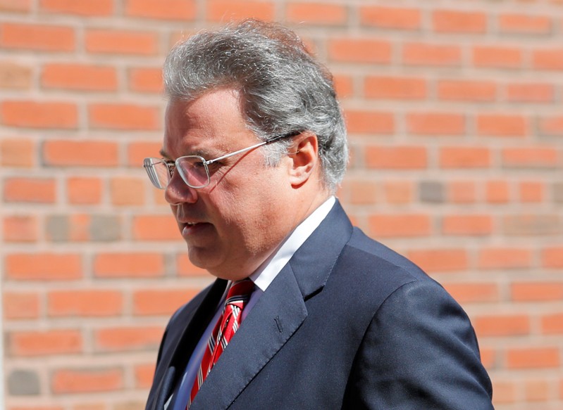 FILE PHOTO: Manuel Henriquez, founder and chairman and CEO of Hercules Technology Growth Capital, facing charges in a nationwide college admissions cheating scheme, enters federal court in Boston