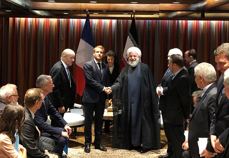 French President Emmanuel Macron shakes hands with Iranian President Hassan Rouhan in New York